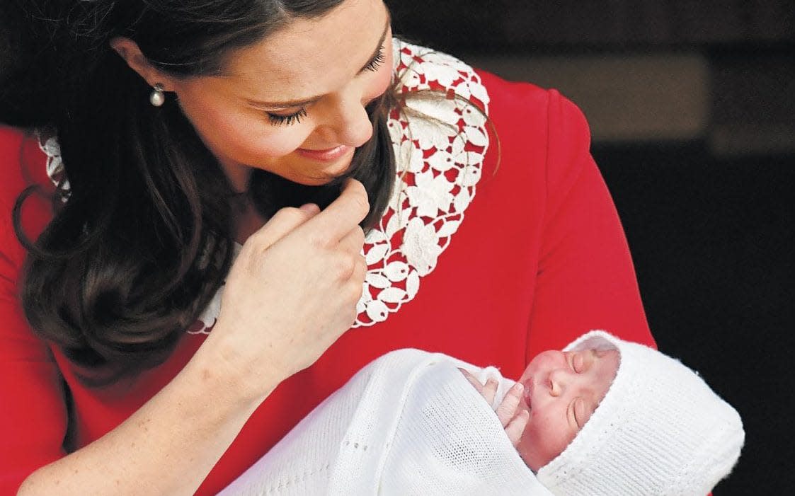 The front page image of The Daily Telegraph showed a besotted Duchess of Cambridge with her new baby boy - Telegraph 