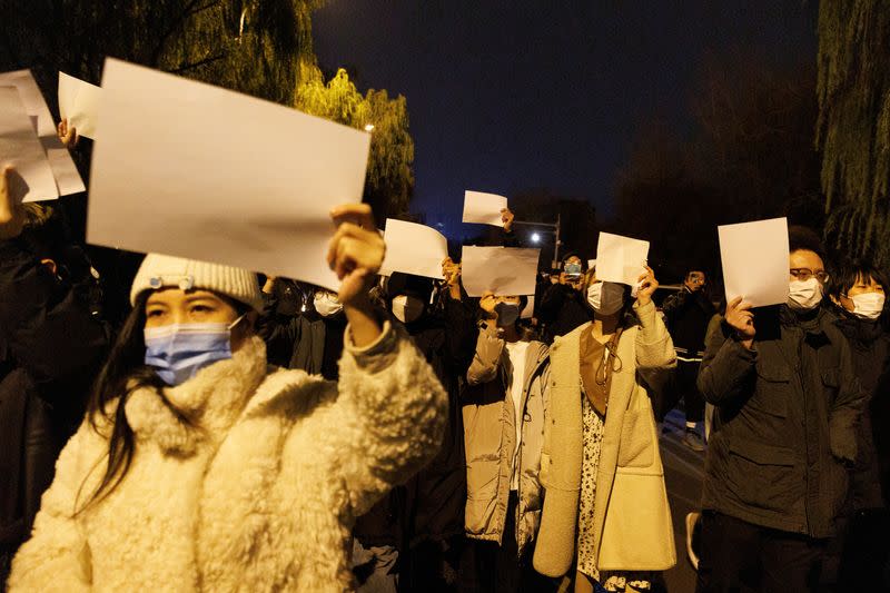 Vigil commemorating victims of a fire in Urumqi, in Beijing