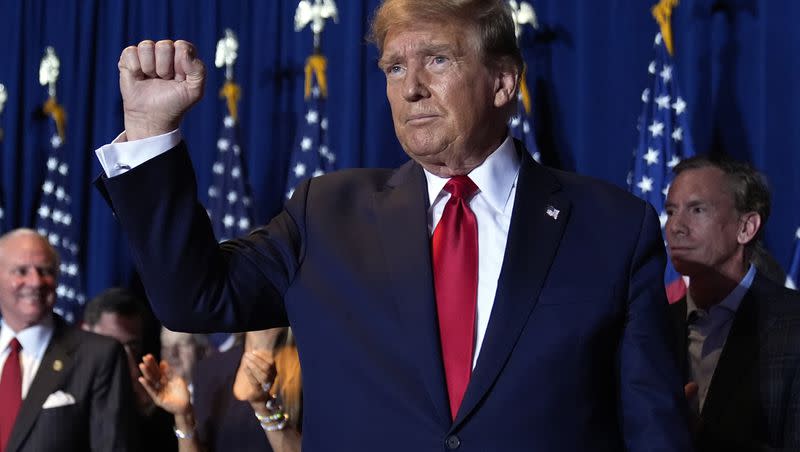 Republican presidential candidate former President Donald Trump reacts at a primary election night party at the South Carolina State Fairgrounds in Columbia, S.C., Saturday, Feb. 24, 2024.