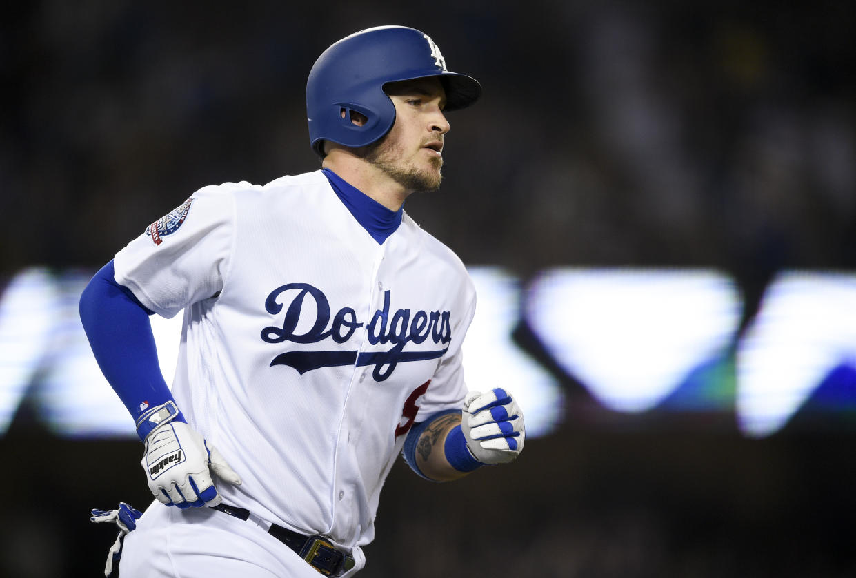 Los Angeles Dodgers’ Yasmani Grandal is the rare catcher who’s hitting well in 2018 (AP Photo).