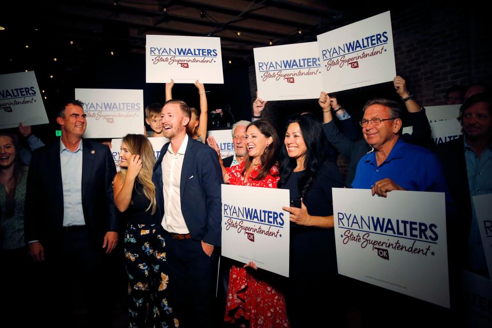 Ryan Walters celebrates winning the GOP primary runoff election for state superintendent during a watch party Tuesday in Oklahoma City.