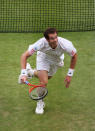 Andy Murray of Great Britain runs to the baseline in his Gentlemen's Singles final match against Roger Federer at Wimbledon.