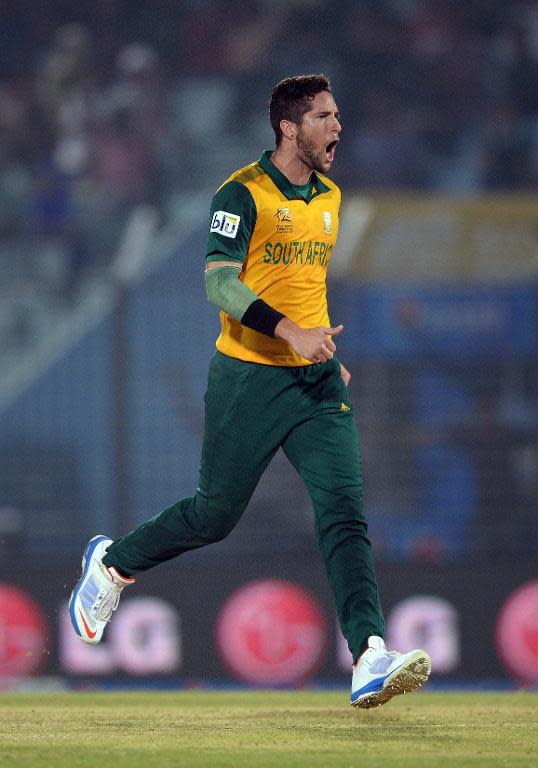 South Africa bowler Wayne Parnell celebrates the wicket of England batsman Michael Lumb during an ICC World Twenty20 tournament cricket match at The Zahur Ahmed Chowdhury Stadium in Chittagong on March 29, 2014