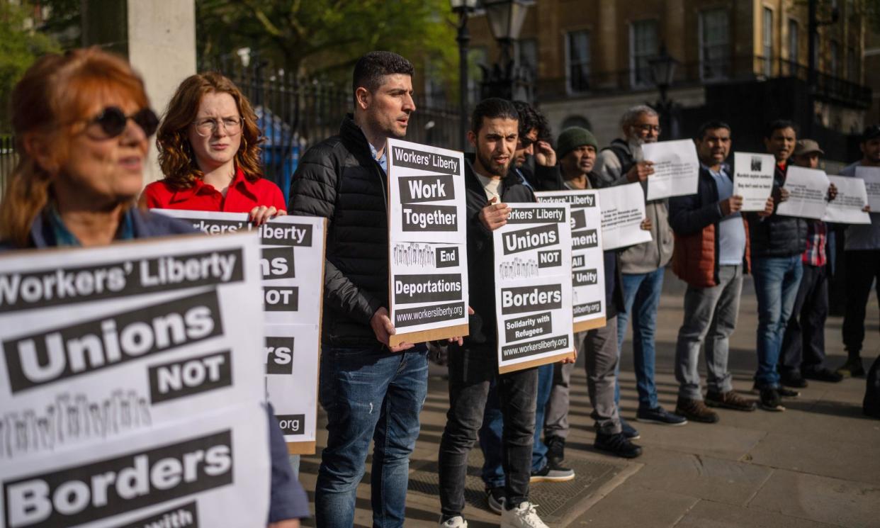 <span>People protest against the Rwanda deportation bill outside Downing Street on 1 May. </span><span>Photograph: Carl Court/Getty Images</span>