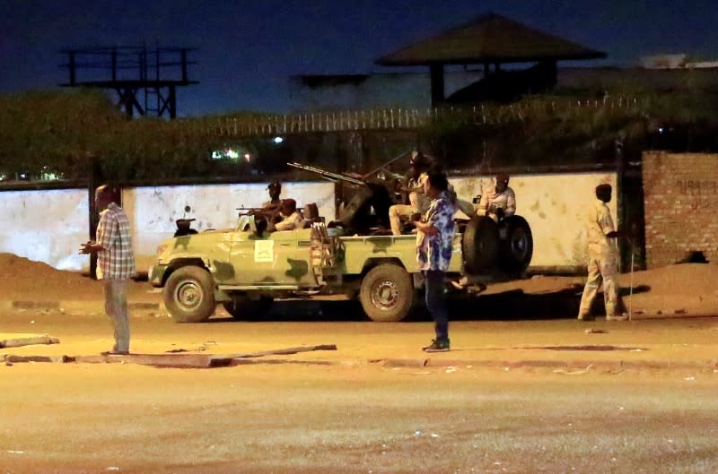 Members of Sudanese Rapid Support Forces are seen near the area where gunmen opened fire in Khartoum