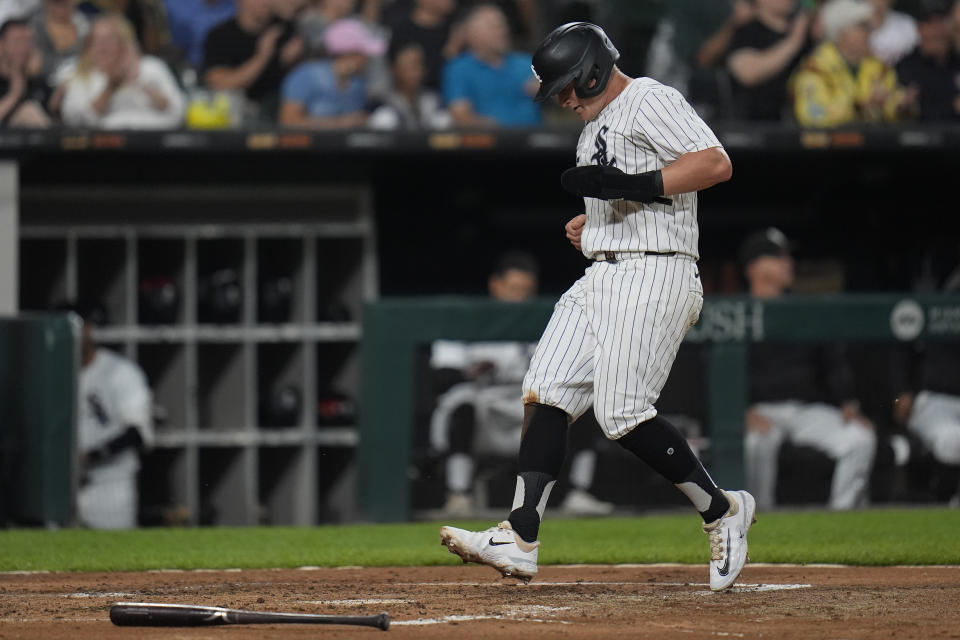 Chicago White Sox's Andrew Vaughn scores on a single from Nicky Lopez during the second inning of a baseball game against the Colorado Rockies, Friday, June 28, 2024, in Chicago. (AP Photo/Erin Hooley)
