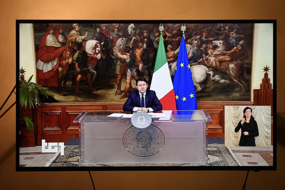 TURIN, ITALY - 2020/04/01: An image on television of Italian Prime Minister Giuseppe Conte, broadcast by channel RAI 1, announcing to the Italian people the extension of the restrictions to contain the crisis caused by the coronavirus until April 13th. The Italian government imposed unprecedented restrictions to halt the spread of COVID-19 coronavirus outbreak, among other measures people movements are allowed only for work, for buying essential goods and for health reasons. (Photo by Nicolò Campo/LightRocket via Getty Images)