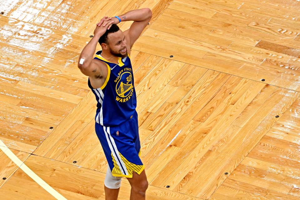 Warriors guard Stephen Curry (30) celebrates after beating the Celtics in Game 6 of the NBA Finals to win the NBA Championship at TD Garden.