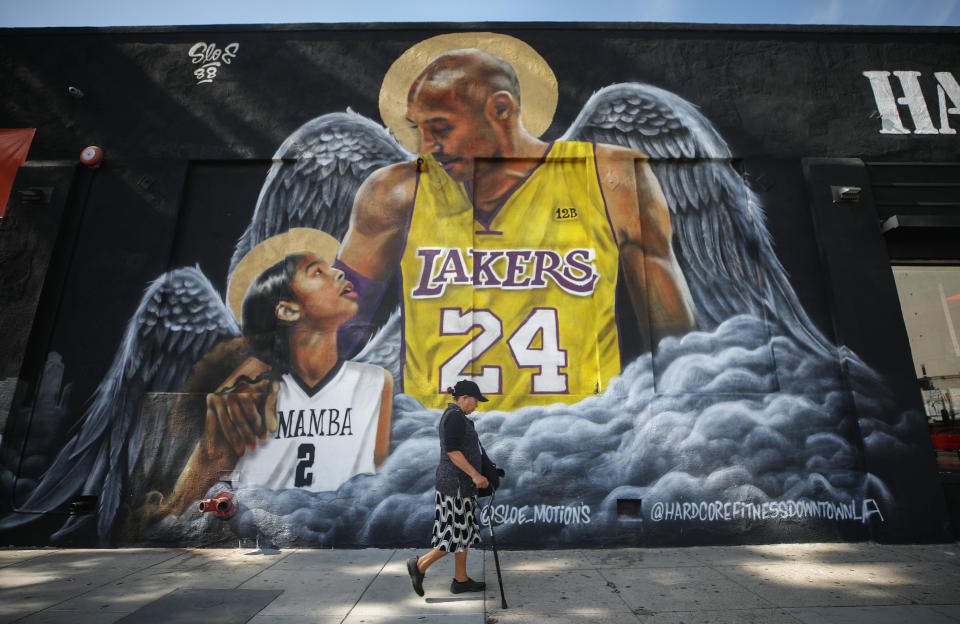 LOS ANGELES, CALIFORNIA - FEBRUARY 13: A mural depicting deceased NBA star Kobe Bryant and his daughter Gianna, painted by @sloe_motions, is displayed on a building on February 13, 2020 in Los Angeles, California. Numerous murals depicting Bryant and Gianna have been created around greater Los Angeles following their tragic deaths in a helicopter crash which left a total of nine dead. A public memorial service honoring Bryant will be held February 24 at the Staples Center in Los Angeles, where Bryant played most of his career with the Los Angeles Lakers.  (Photo by Mario Tama/Getty Images)