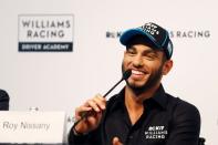 Israeli racing driver Roy Nissany holds a news conference after signing with British Formula One motor racing team Williams in Tel Aviv