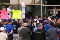 Law enforcement officers gather in support of two police officers who were arraigned in Buffalo