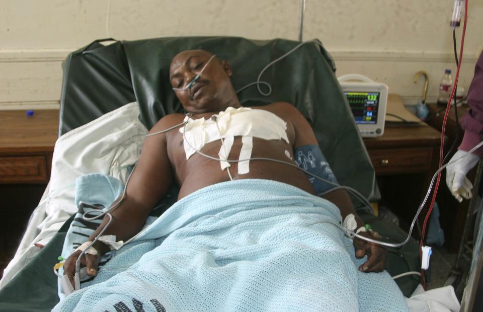 Steven Kang'ethe receives treatment at a hospital after he was shot when gunmen attacked Hindi village, near Lamu