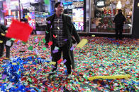 <p>People throw confetti on New Year’s Eve in Times Square on January 1, 2018 in New York City. (Photo: Stephanie Keith/Getty Images) </p>