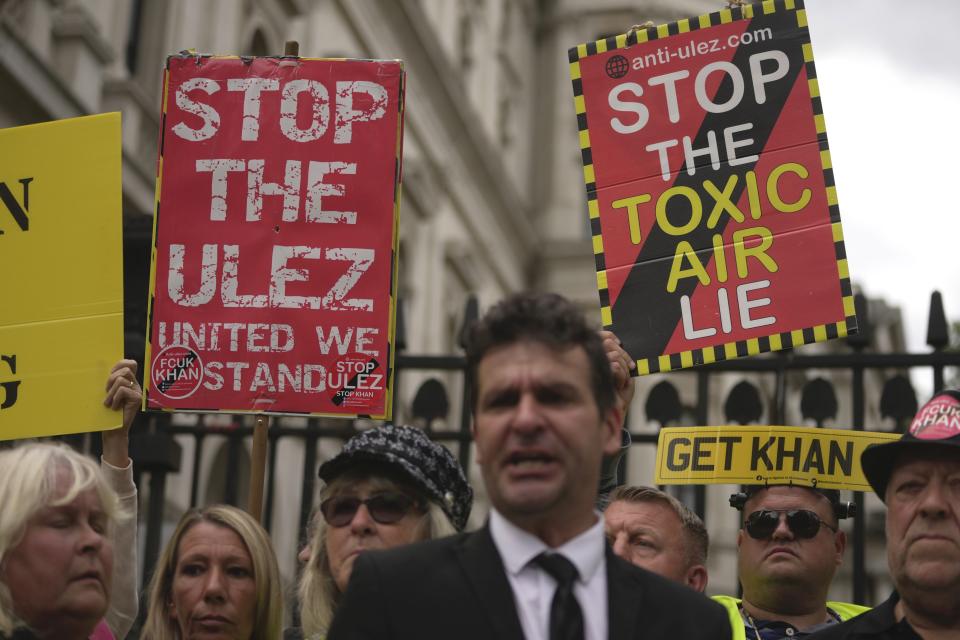 Protesters demonstrate outside the Downing Street against the Ultra-Low Emission Zone (ULEZ) expansion, in London, Tuesday, Aug. 29, 2023. The ULEZ comes into effect. London's Labour mayor Khan is at odd with the Tory PM and his party over the restrictions. (AP Photo/Kin Cheung)