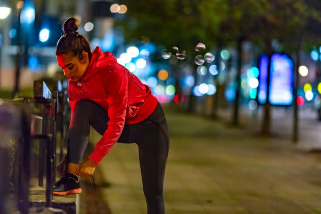 Don't start an early-morning or late-evening sweat session without these products. (Photo: ljubaphoto via Getty Images)