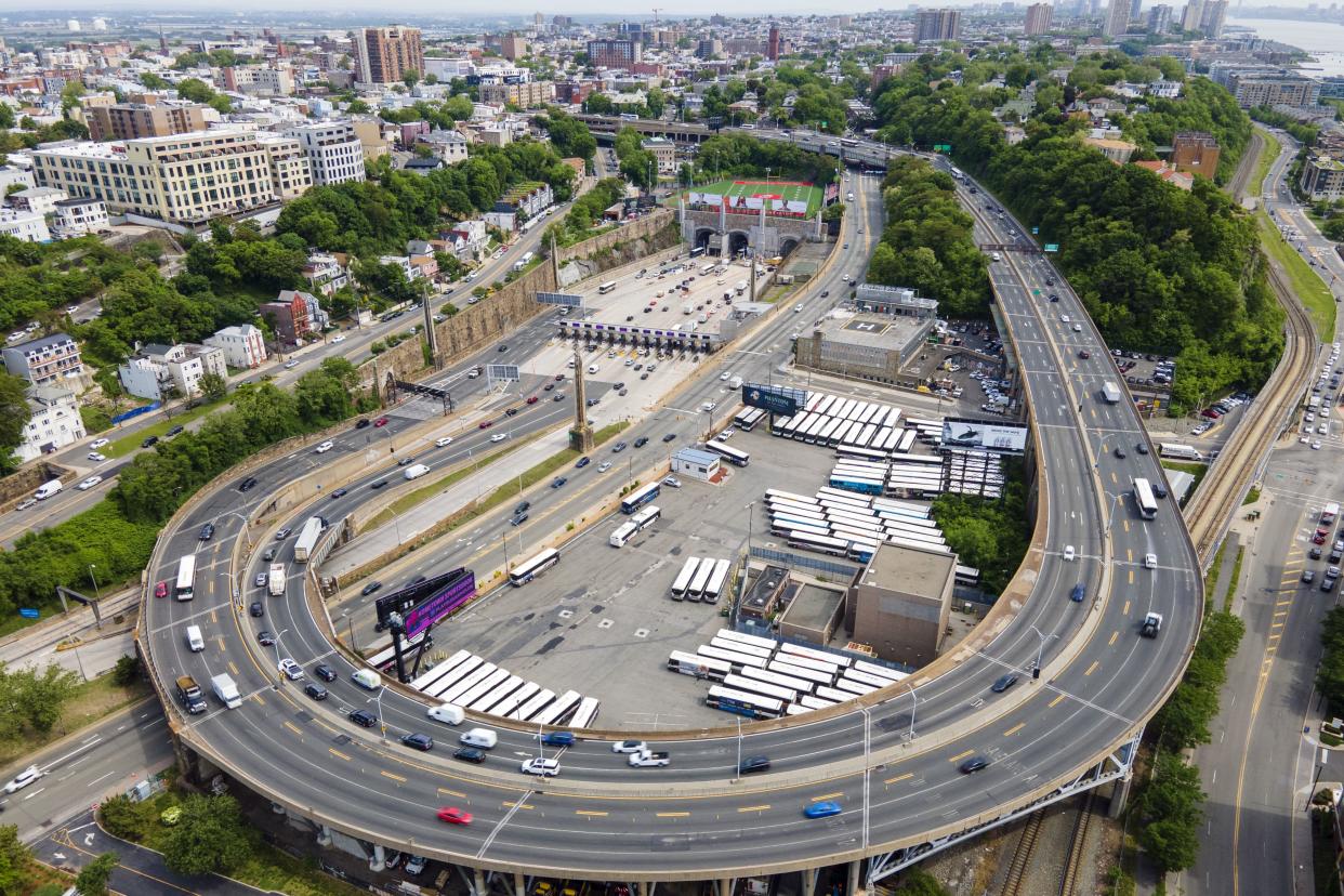 In this aerial image taken with a drone, vehicles move in and out of the Lincoln Tunnel, coming and going between New York City and Weehawken, N.J., on Thursday, May 26, 2022. 