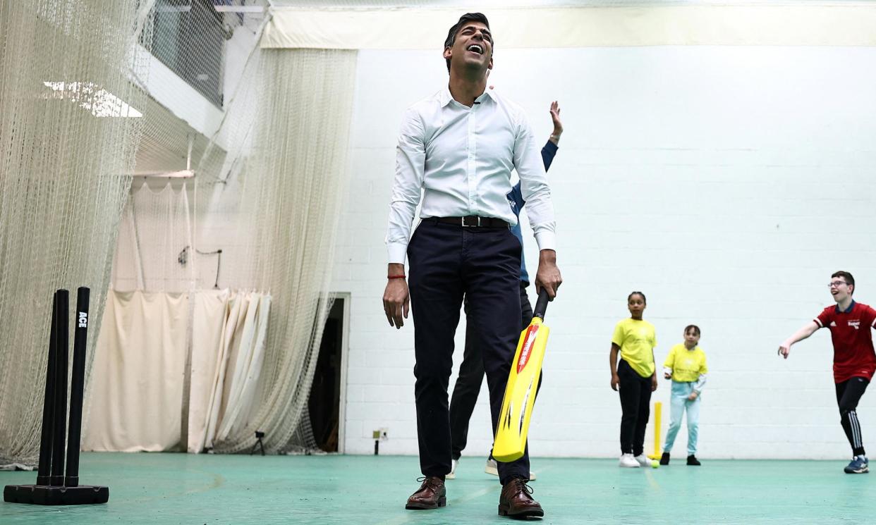 <span>Rishi Sunak is bowled out at a cricket practice session during a visit to the Oval in London.</span><span>Photograph: Henry Nicholls/Reuters</span>