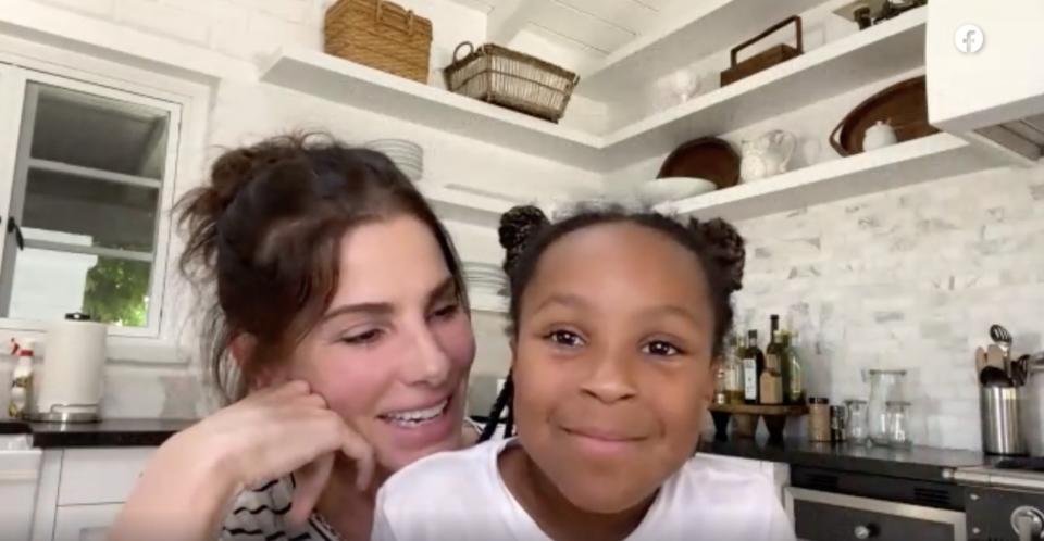 Sandra Bullock and her daughter Laila thank a nurse fighting COVID-19.