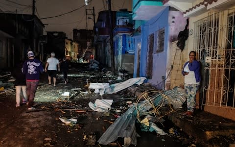 The sound of sirens could be heard throughout the city in the early hours - Credit: Adalberto Roque/AFP