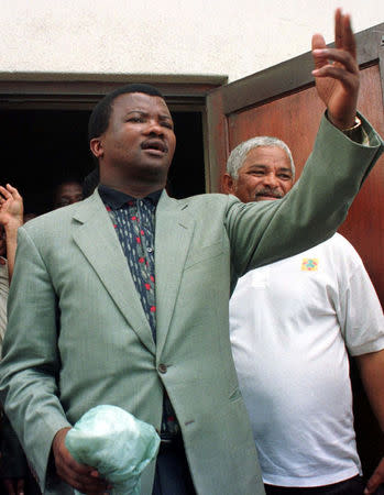 FILE PHOTO: United Democratic Movement (UDM) leader Bantu Holomisa addresses a meeting in Nyanga township near Cape Town, South Africa March 10, 1999. REUTERS/Mike Hutchings/File Photo