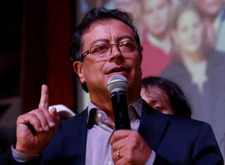 Colombian presidential candidate Gustavo Petro speaks to supporters after polls closed in the first round of the presidential election in Bogota, Colombia May 27, 2018. REUTERS/Henry Romero