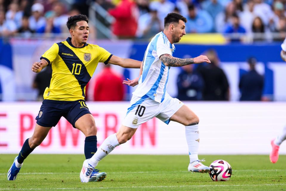 Jun 9, 2024; Chicago, Illinois, USA; Argentina forward Lionel Messi (10) dribbles the ball against Ecuador during the second half at Soldier Field. Mandatory Credit: Daniel Bartel-USA TODAY Sports
