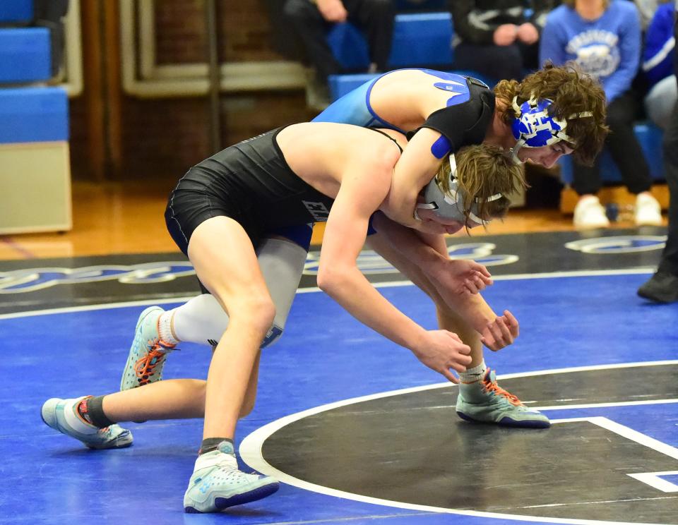 Horseheads' Cody Dale, top, was a 5-3 winner over Elmira's Max Collins in a 138-pound match during the Section 4 Division I Dual Meet Championship final Jan. 17, 2024 at Horseheads High School. The Blue Raiders won, 51-14.