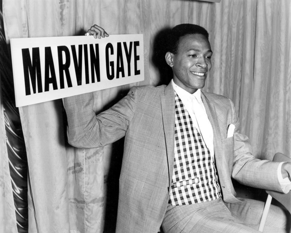 R&B singer Marvin Gaye holds court at a press conference at Heathrow Airport in circa 1964 as he arrives in London, England. (Photo by Michael Ochs Archives/Getty Images)  