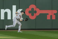 Houston Astros right fielder Kyle Tucker catches a fly ball hit by Seattle Mariners' Dylan Moore during the third inning of a baseball game Saturday, April 17, 2021, in Seattle. (AP Photo/Ted S. Warren)