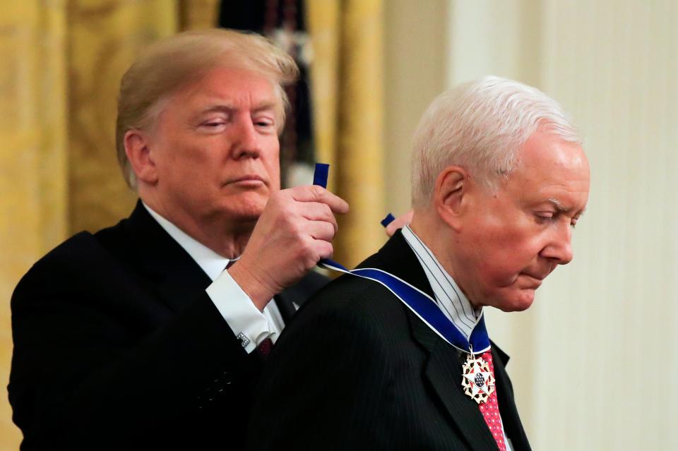 President Donald Trump presents the Presidential Medal of Freedom to Sen. Orrin Hatch, R-Utah, during a ceremony in the East Room of the White House, in Washington, on Friday, Nov. 16, 2018. A longtime senator known for working across party lines, Hatch died Saturday, April 23, 2022, at age 88.