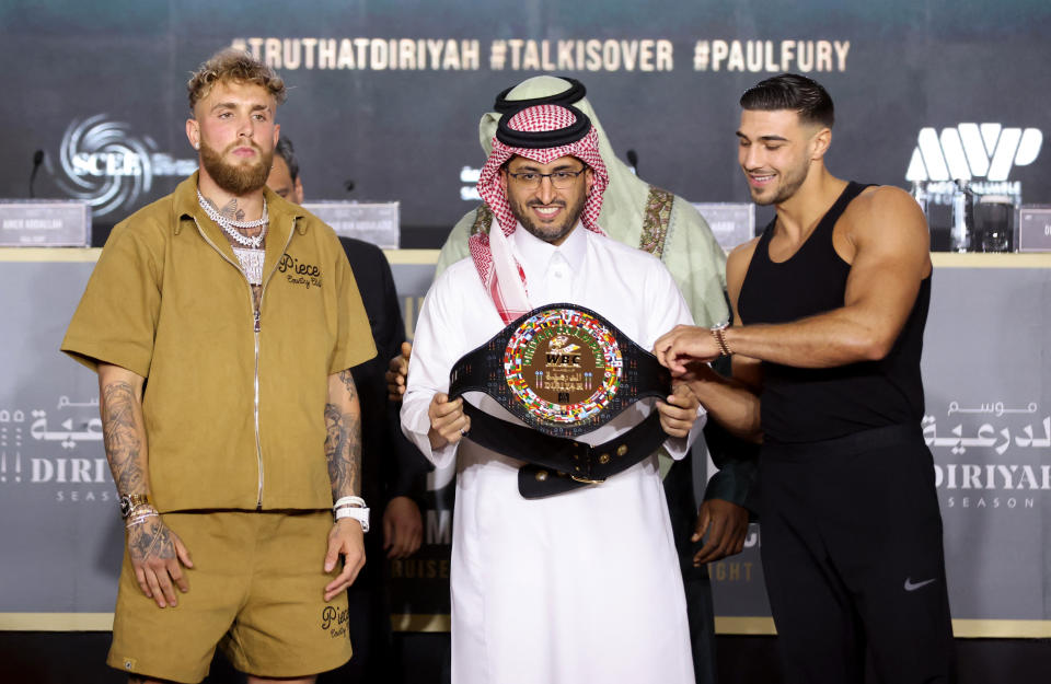 Boxing - Jake Paul v Tommy Fury Press Conference - Riyadh, Saudi Arabia - February 23, 2023 Jake Paul and Tommy Fury pose with the WBC Diriyah Champion belt during the press conference REUTERS/Ahmed Yosri