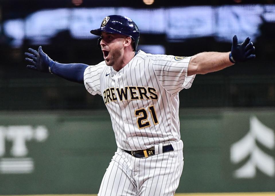 Travis Show celebrates after his walk-off hit against the Dodgers on Saturday.