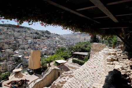 An archaeological site known as the City of David, still an active dig and also a tourist attraction, is seen alongside Silwan (background), a Palestinian neighbourhood close to Jerusalem's Old City June 30, 2016. REUTERS/Ammar Awad