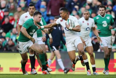 England's Anthony Watson gets past a tackle from Ireland's Robbie Henshaw. Ireland v England - RBS Six Nations Championship 2015 - Aviva Stadium, Dublin, Republic of Ireland - 1/3/15. Action Images via Reuters / Paul Childs Livepic