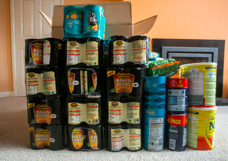 <em>The Mann’s haul of food includes tins of baked beans and chopped tomatoes (SWNS)</em>