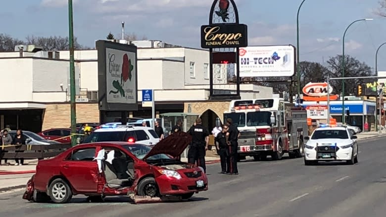 3 taken to hospital after crash involving Winnipeg police car on Main Street