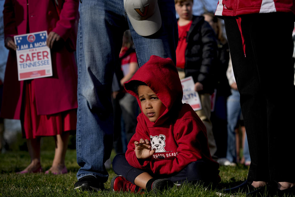 Isaiah Smith, 5, attends the Linking Arms for Change human chain Wednesday, March 27, 2024, in Nashville, Tenn. The event was to commemorate the one-year anniversary of the Covenant School mass shooting. (AP Photo/George Walker IV)