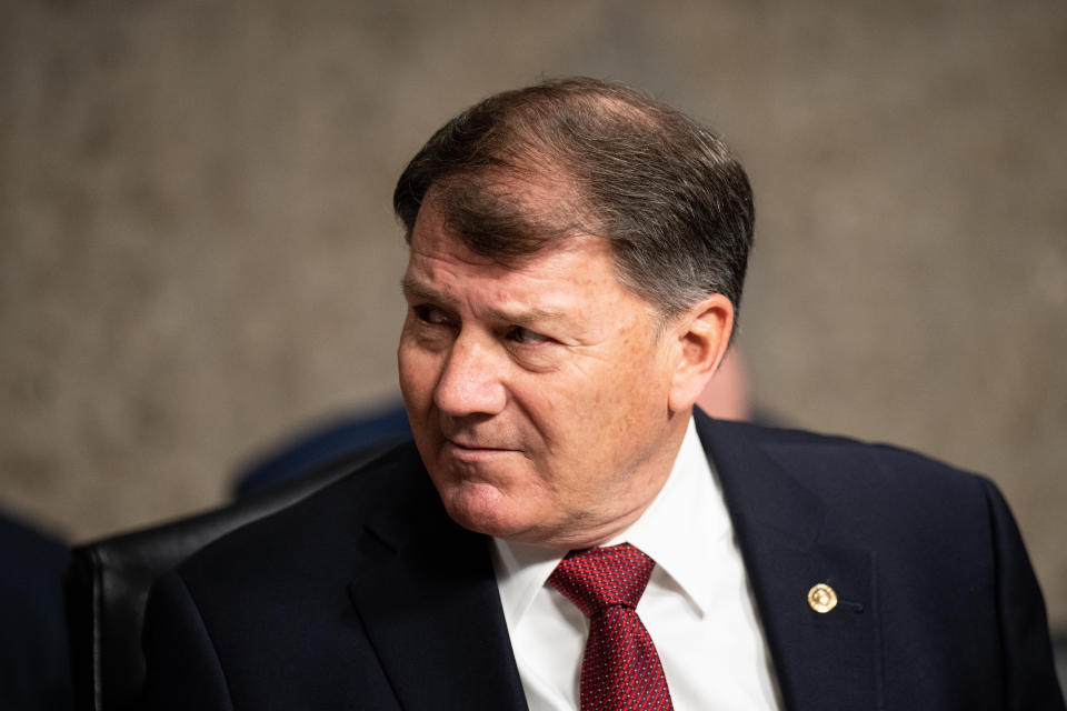 Senator Mike Rounds sits at a Senate Armed Services Committee hearing.