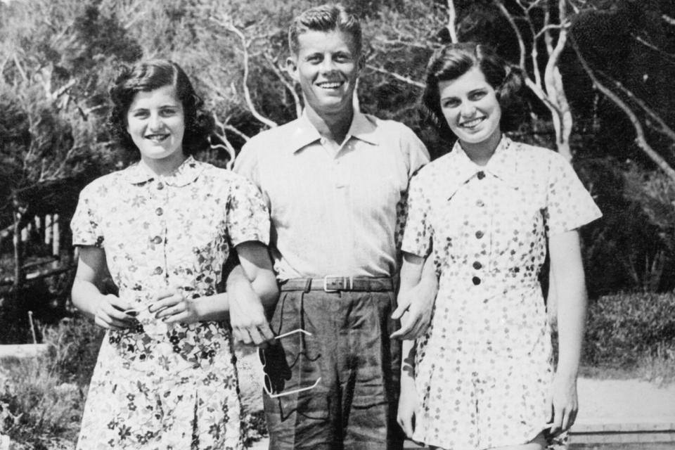 1935- Cannes, France- Photo shows: at Cannes - three of the Kennedy family - Miss Eunice (right), Miss Patricia (left) and their brother Jack. They are the children of the U.S. Ambassador to Great Britain, and spent a holiday with their parents in the hills above Cannes.