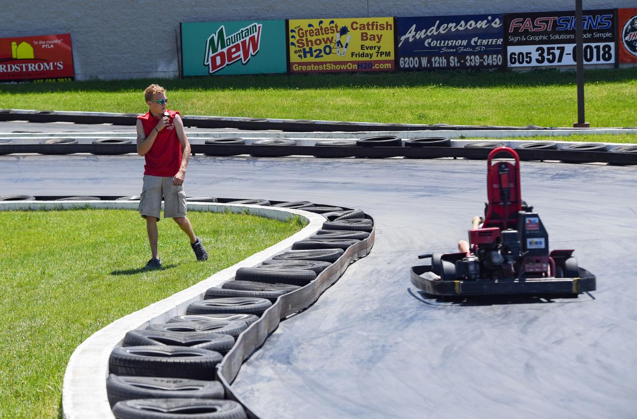 Employee Owen Hirsch monitors go-kart safety on Thursday, June 3, 2021 at Thunder Road in Sioux Falls.