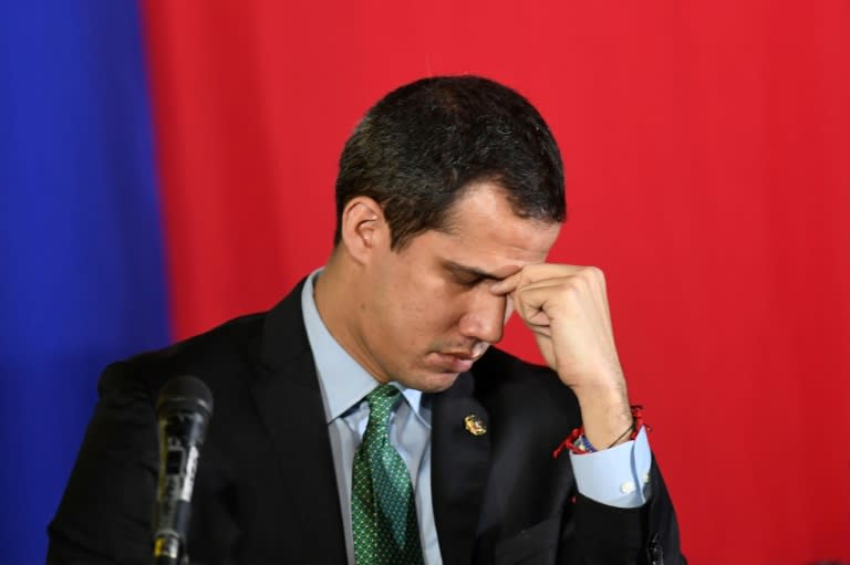 Venezuela's opposition leader and self-proclaimed acting president Juan Guaido, pictured in 2020, faces an increasingly difficult task in maintaining his relevance amidst a deeply fractured opposition (AFP/Federico PARRA)