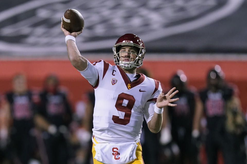 Southern California quarterback Kedon Slovis throws a pass during the first half of the team's NCAA college football game against Utah on Saturday, Nov. 21, 2020, in Salt Lake City. (AP Photo/Rick Bowmer)