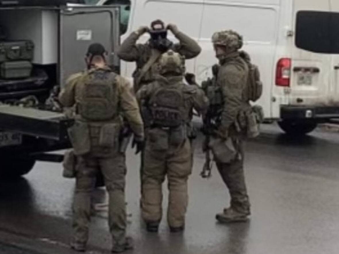 The RCMP responded in force with heavily armed officers and an armoured vehicle following a home invasion and shooting in Placentia on Dec. 23-24. (Submitted photo/Name withheld by CBC - image credit)