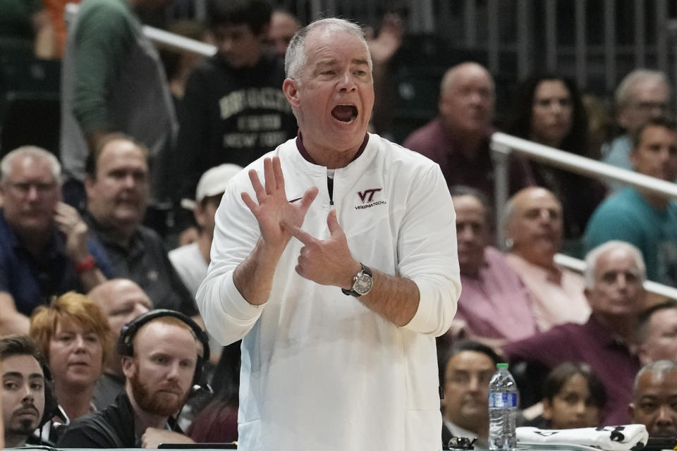 Virginia Tech head coach Mike Young gestures during the first half of an NCAA college basketball game against Miami , Tuesday, Jan. 31, 2023, in Coral Gables, Fla. (AP Photo/Marta Lavandier)