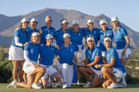 Europe's team pose with the trophy after winning the Solheim Cup golf tournament in Finca Cortesin, near Casares, southern Spain, Sunday, Sept. 24, 2023. (AP Photo/Bernat Armangue)