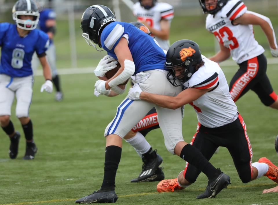 Summerfield safety Eli VanHuysen makes a tackle during a 14-7 victory over Waterford Our Lady of the Lakes Friday.