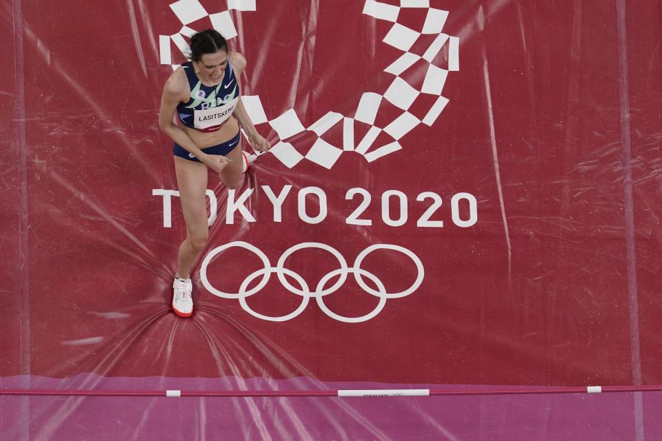 Mariya Lasitskene, of Russian Olympic Committee, competes during the finals of the women's high jump at the 2020 Summer Olympics, Saturday, Aug. 7, 2021, in Tokyo. (AP Photo/Morry Gash)