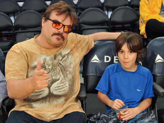 <p>Allen Berezovsky/Getty</p> Jack Black and son Thomas Black attend a basketball game between the Los Angeles Lakers and the Atlanta Hawks at Staples Center on January 7, 2018.