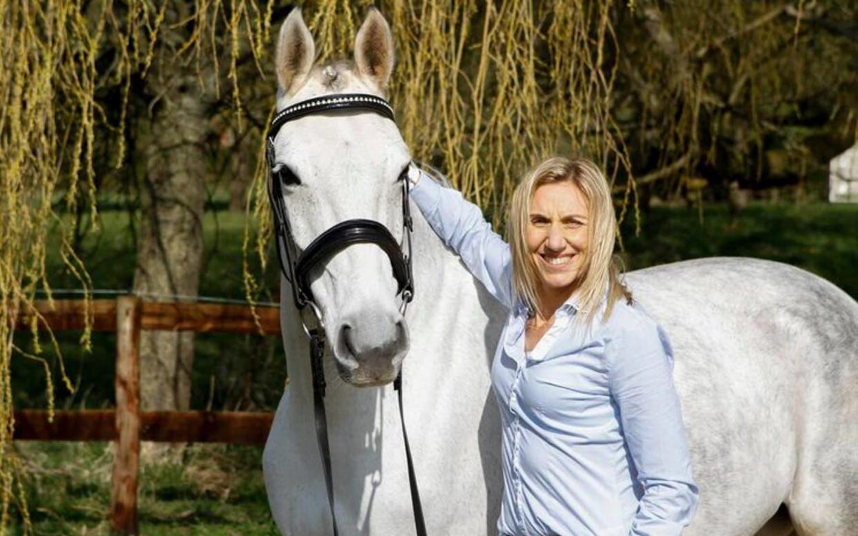 Lisa Ashton appears alongside her own horse