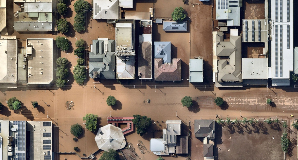 An aerial view of homes hit by flooding disaster.